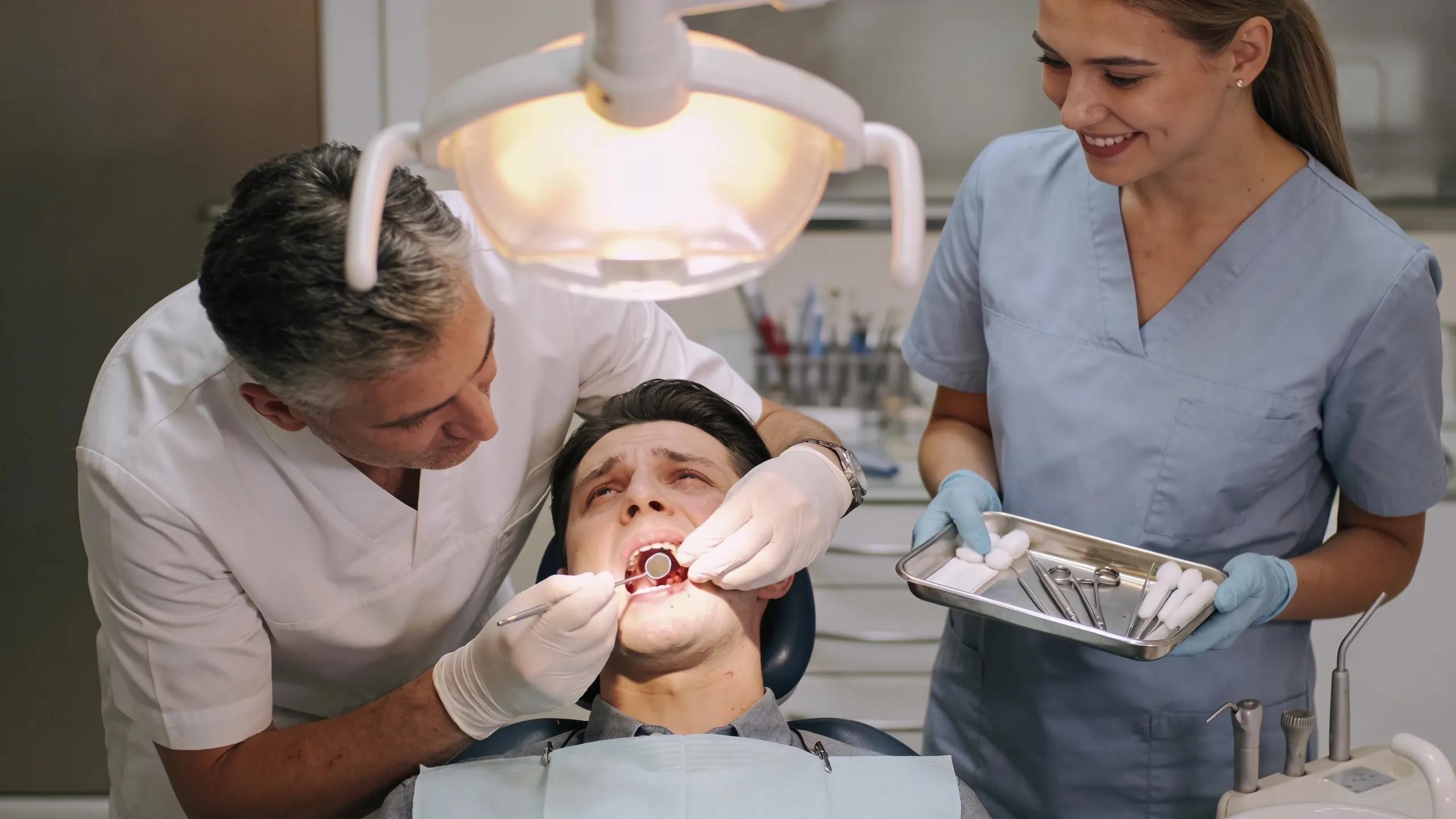 Dental emergency scene with a patient receiving care from a dentist in a Portage Park clinic